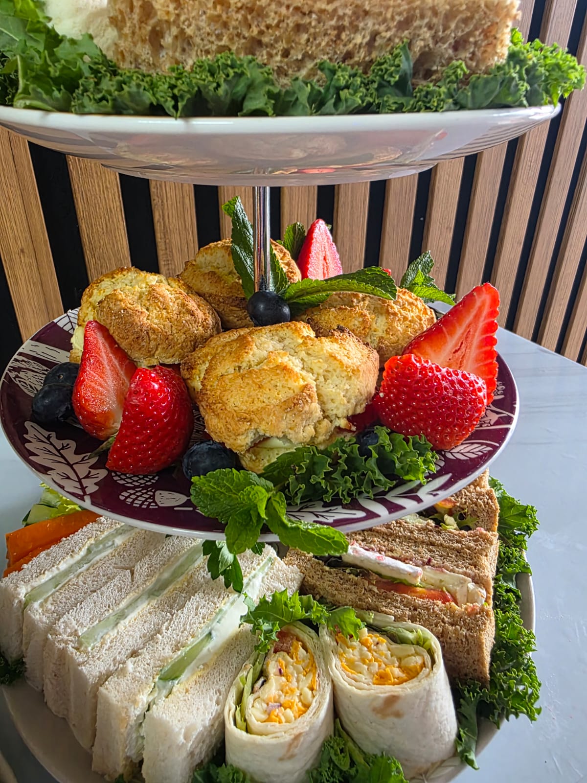 Tiered tower with pink roses and scones
